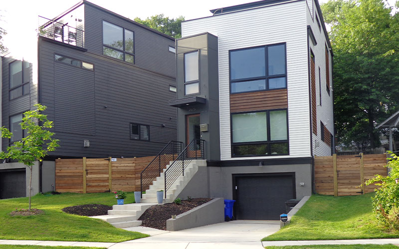 custom privacy fencing installed between homes