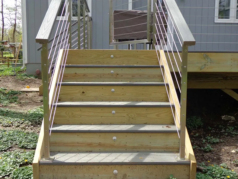 Small staircase leading up to a hybrid deck