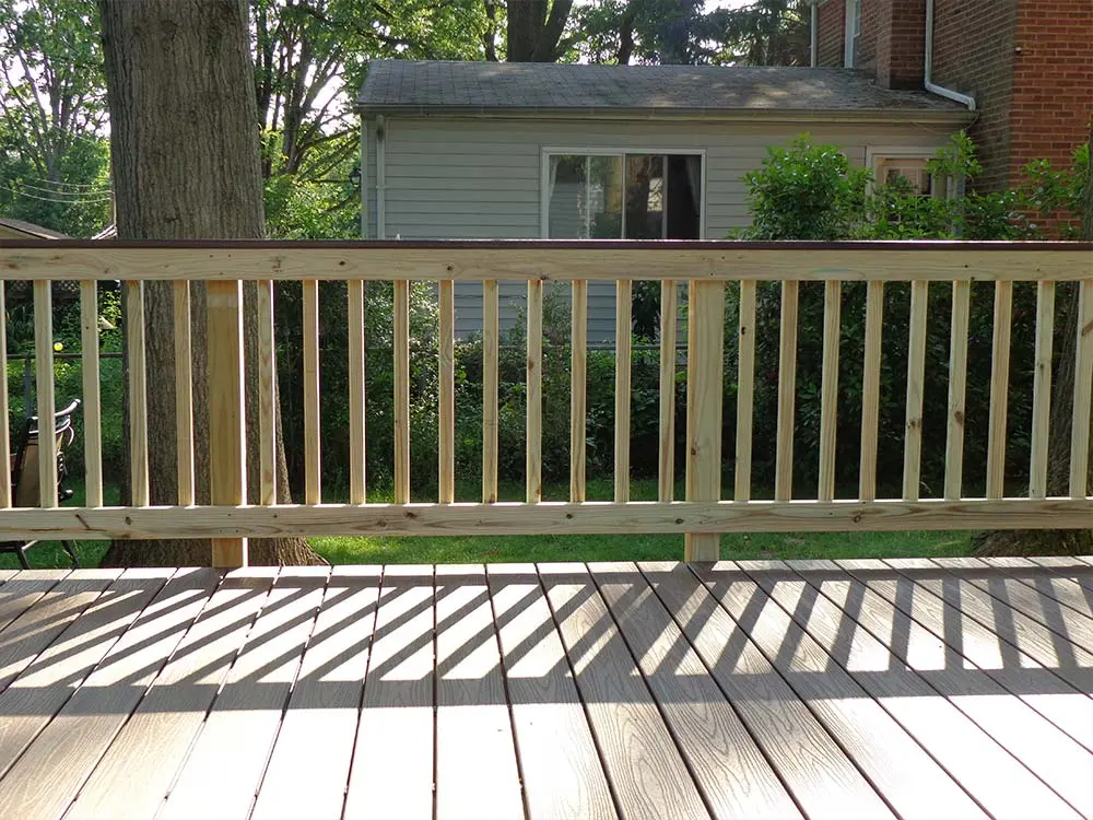 Wood style railing on hybrid deck