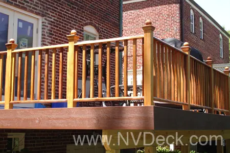 Red brick home with hybrid deck