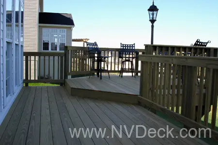 Wood Deck with raised octogonal area with four chairs