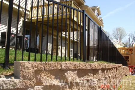 Black Steel Fence along side of house
