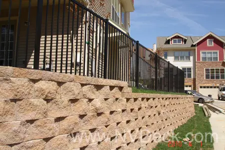 Steel Fence aboved brick barrier wall