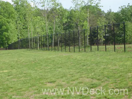 Aluminum fence seperating open field