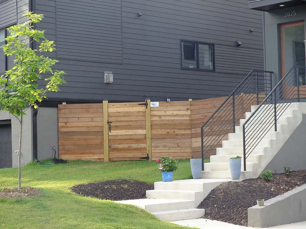 Cedar Fence connecting between two multifloor homes