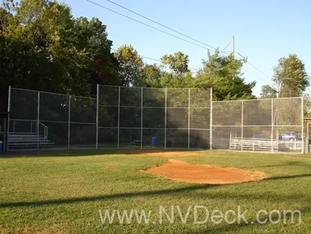 Chain Link Fence behind home plate in baseball field