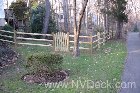 Pine Post and Rail Fence with vertical board gate