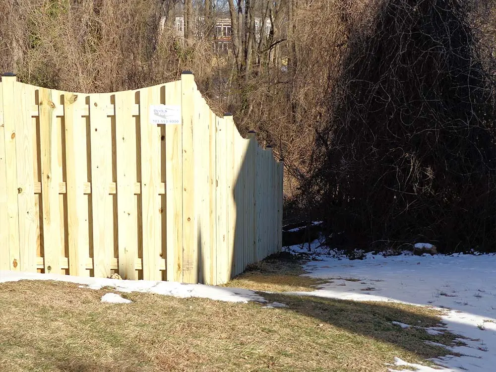 Corner of Vertical Board Pine Fence