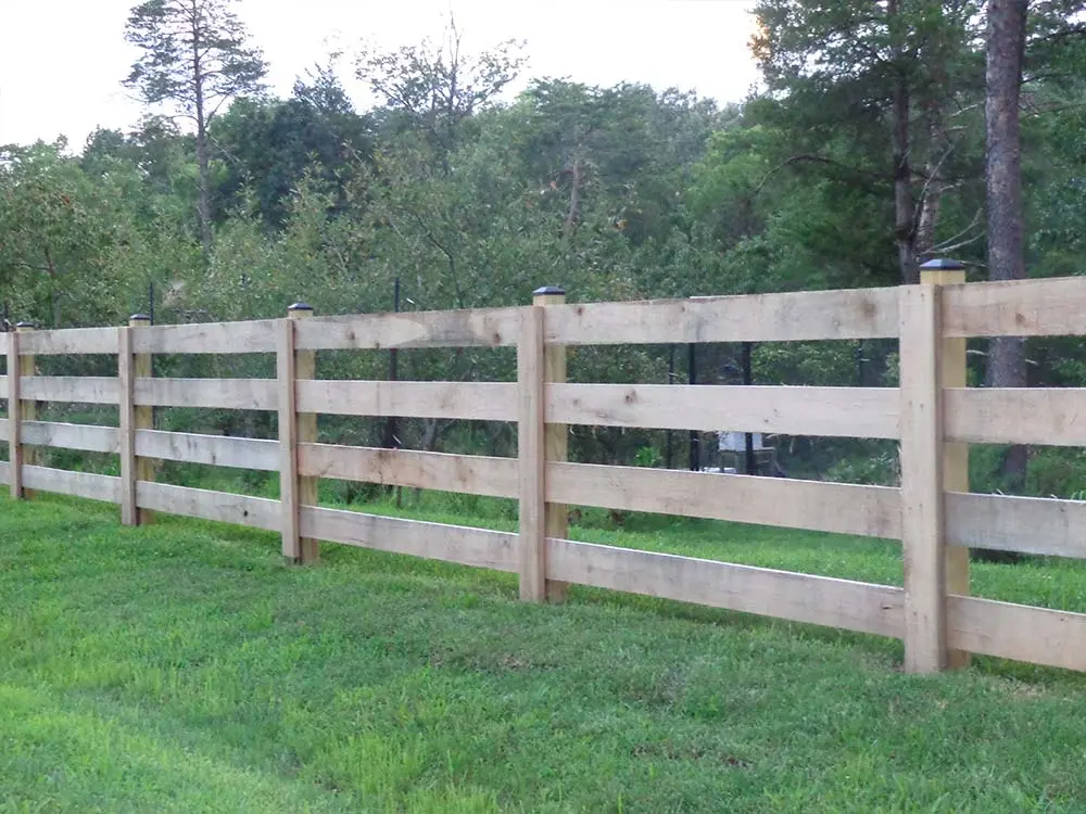 Post and Rail Pine Fence in grassy area