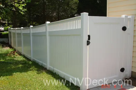 Tall Vinyl Fence with Lattice Accents at the Top